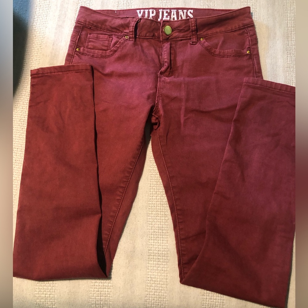 Girls size 16 ( fits size 2 adult) muted maroon color jeans.